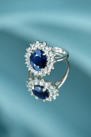 $Bague Soleil Bleu - Or blanc, topazes et saphir