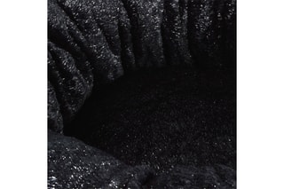 $Coussin rond Noir