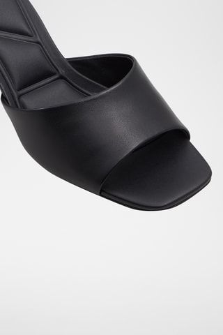 $Mules à talons en cuir de mouton Par - Noir