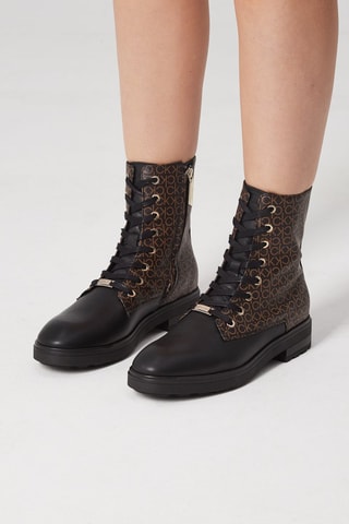 $Bottines en cuir Noir et marron