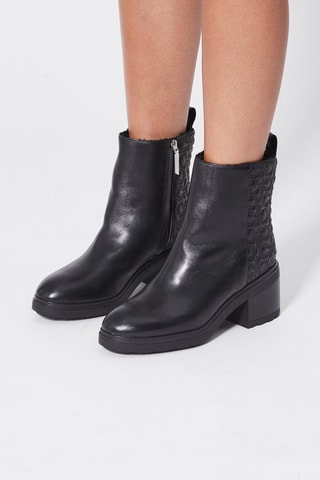 $Bottines en cuir Noir