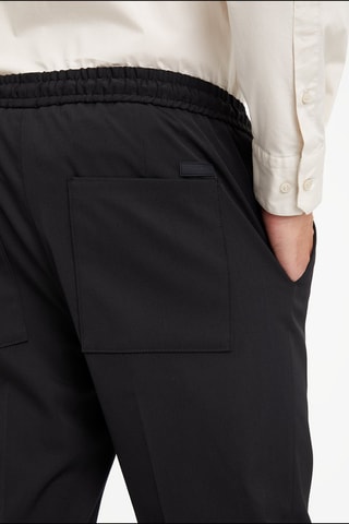 $Pantalon droit en laine Noir