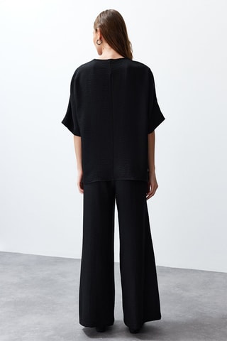 Blusa e calças - Preto