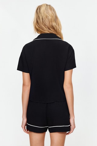 Camisa e calções Preto