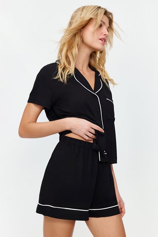 Camisa e calções Preto