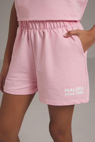 T-shirt oversize e calções - Rosa