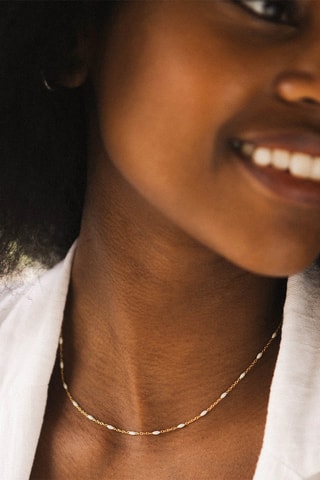Bougie et collier beige Essentielles - Monoï des îles