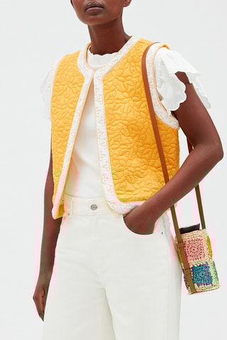 Veste sans manches. - Blanc et jaune