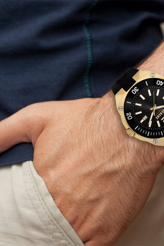 Montre à quartz en silicone et plaqué ion or jaune Versus Reaction - Noir