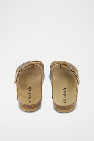 Mules en cuir 
Marron