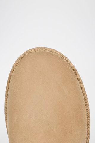 Bottines fourrées en nubuck Classic Ultra Mini - Beige clair