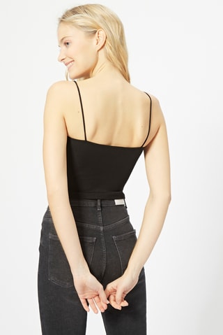 Crop top de malha caneladabr>
Preto