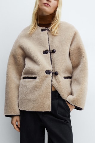 Manteau en fausse fourrure à ornements - Beige