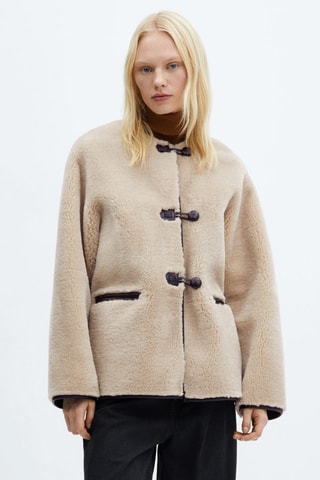 Manteau en fausse fourrure à ornements - Beige