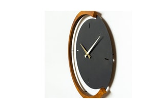 Horloge murale ajourée - 68 x 44 cm - Noir et naturel