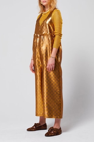 Macacão 
Dourado