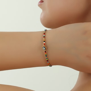 Pulseira olho - Latão banhado a ouro e pedras