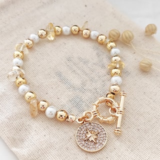 Pulseira estrela - Latão banhado a ouro, pérolas sintéticas e zircões 