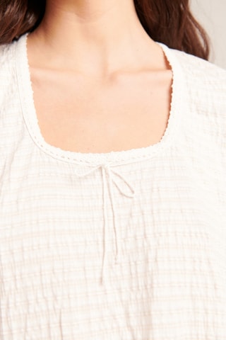 T-shirt - 
Areia