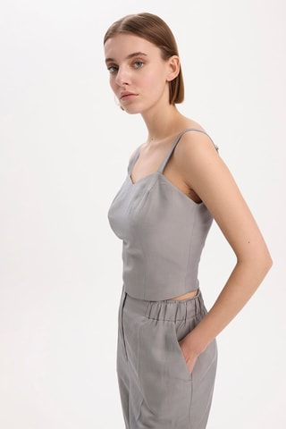 Camisola de alças - 
Cinzento