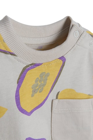 T-shirt. Beige en Mosterdgeel