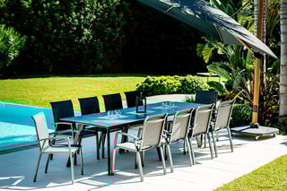 Ensemble repas Eytelia - 10 places - Table 276,5 x 95 x 74 cm - 10 fauteuils empilables