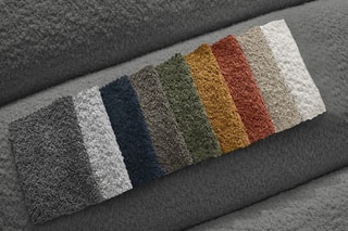 Canapé d'angle gauche et pouf Talia - Gris foncé - 4 places - En tissu bouclette