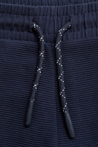 Pantalon jogging poches zippées - Bleu marine