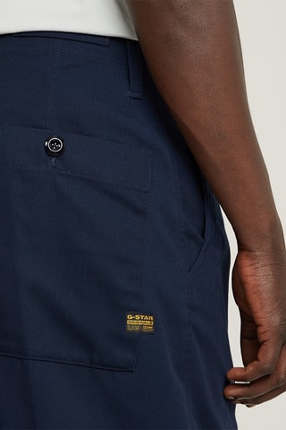 Calças chino relaxed tapered em algodão biológico Pleated - Azul-escuro