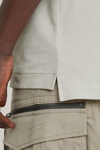 Polo slim em algodão biológico Dunda - Cinzento