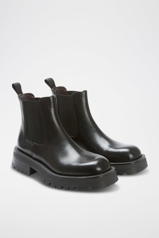Botins Chelsea em couro 
Preto