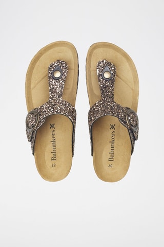Mules em couro 
Dourado