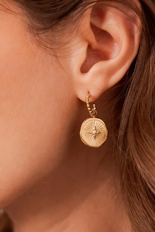Boucles d'oreilles - 
Doré