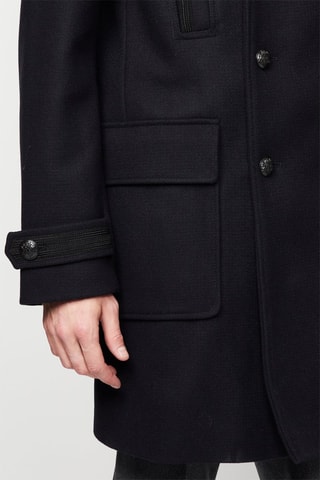 Manteau en laine et fourrure de mouton Noir