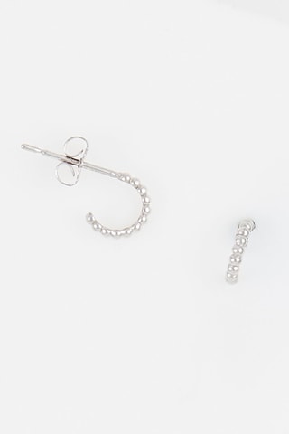 Meias-argolas Demi-cercle 
Ouro branco