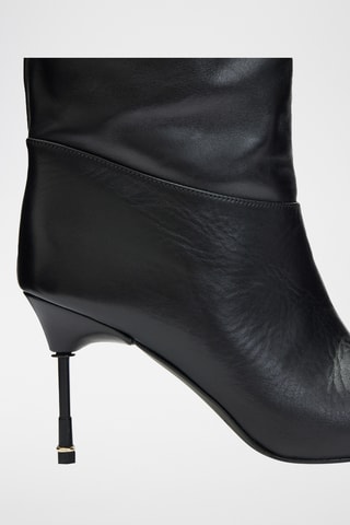Botas em couro - Preto