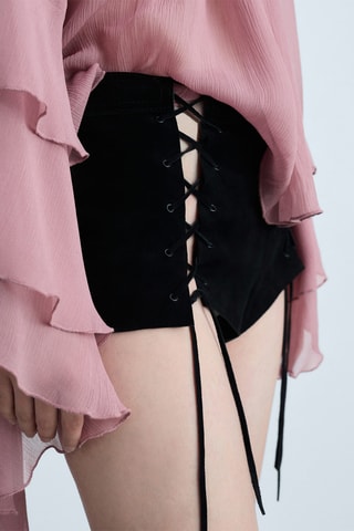 Short cuir ouvertures noeuds - Noir