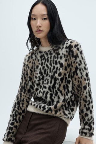 Pull-over fausse fourrure en imprimé animal - Noir