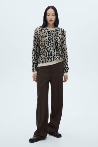 Pull-over fausse fourrure en imprimé animal - Noir