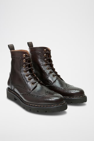 Botins em couro 
Castanho-escuro