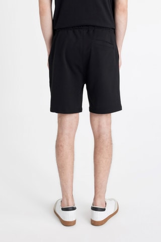 Calções skinny - Preto