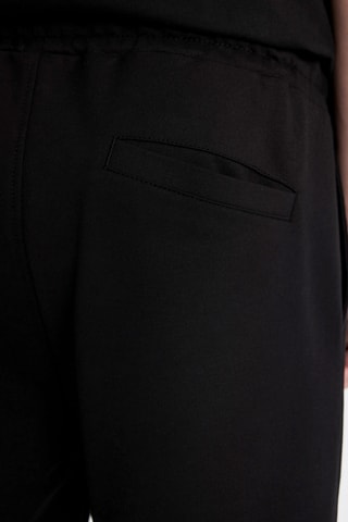 Calções skinny - Preto