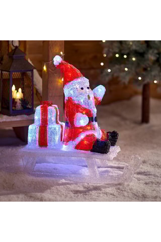Père Noël sur luge LED - Rouge