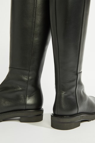 Botas em couro - Preto
