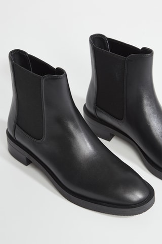 Botins Chelsea em couro - Preto