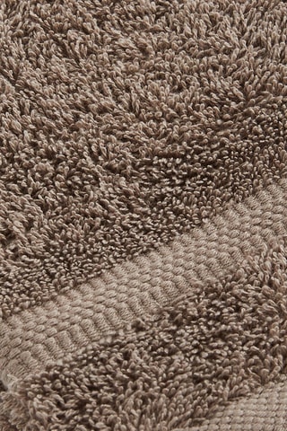 4 gants de toilette Marron