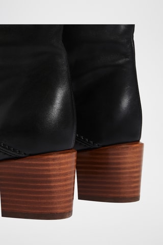 Botas em couro - Preto