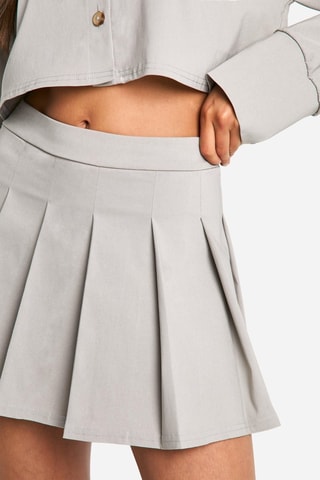 Blusa curta e saia plissada - Toupeira