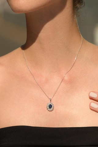 Pendentif Or blanc, topazes et saphir