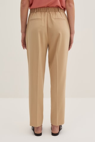 Calças corte cenoura - Bege